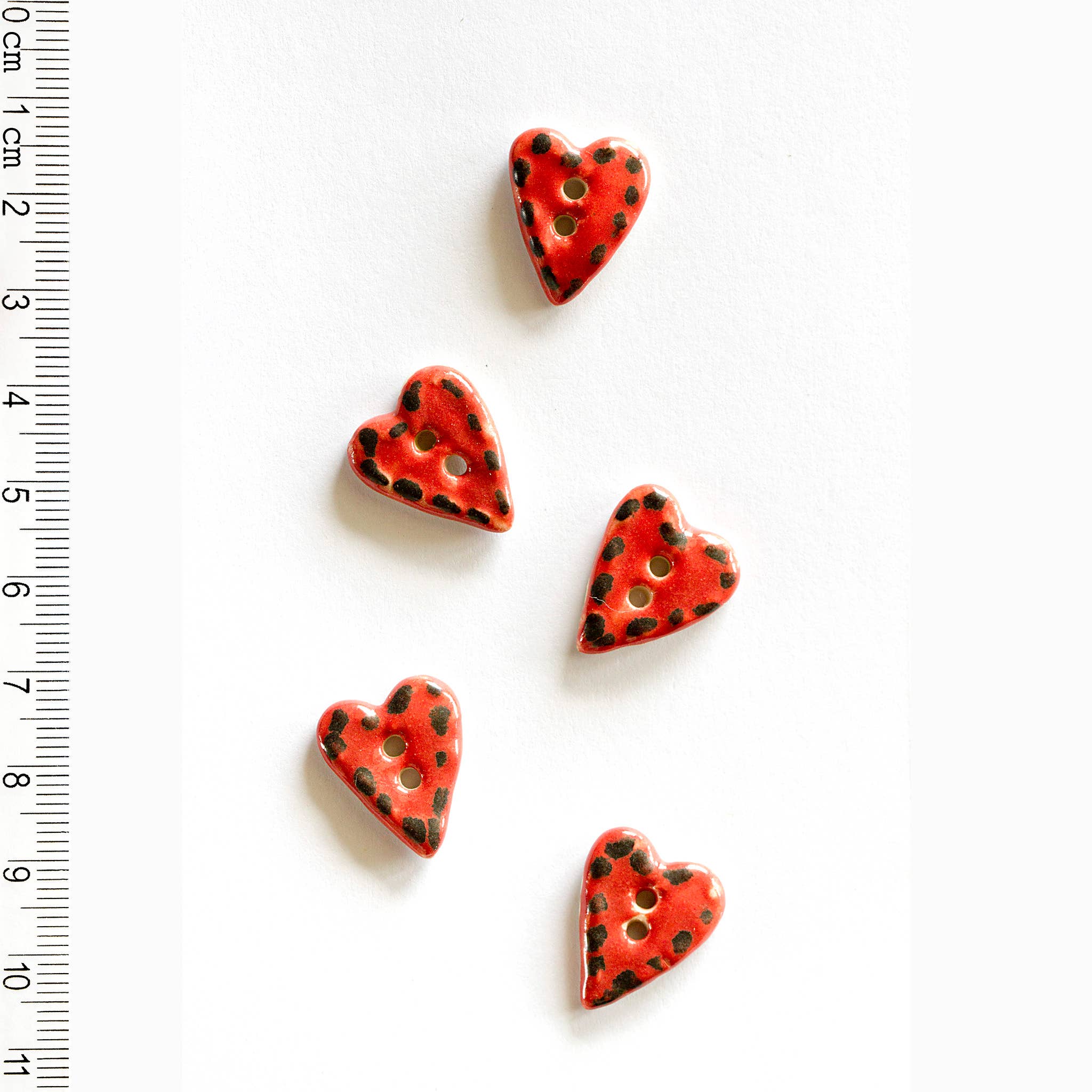Red Heart Buttons with Black Stitching